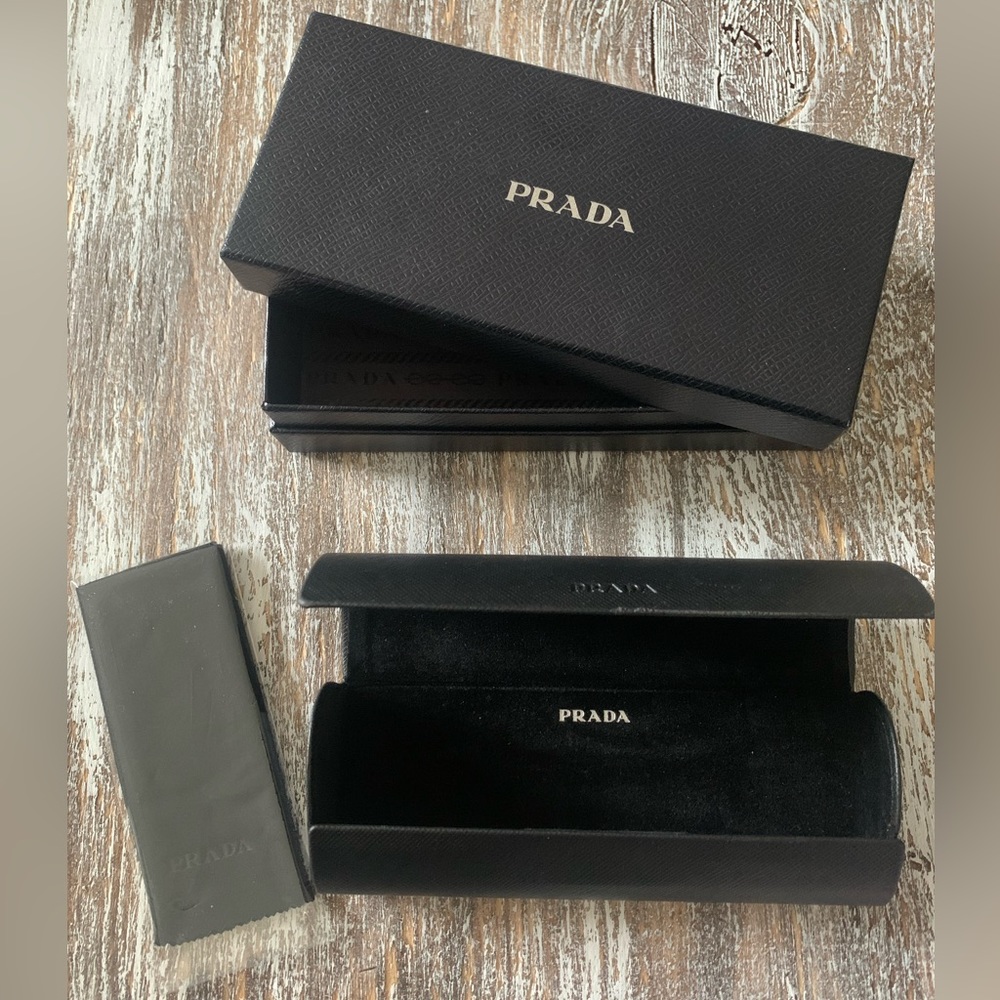 Prada black eye glasses case.